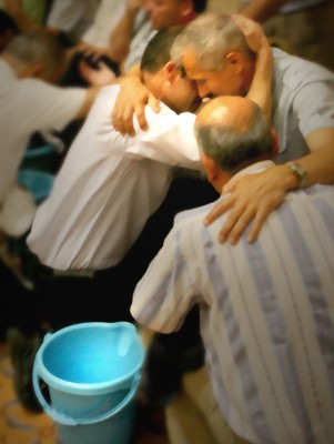 Arab and Jewish pastors wash each other's feet - Nazareth, Israel